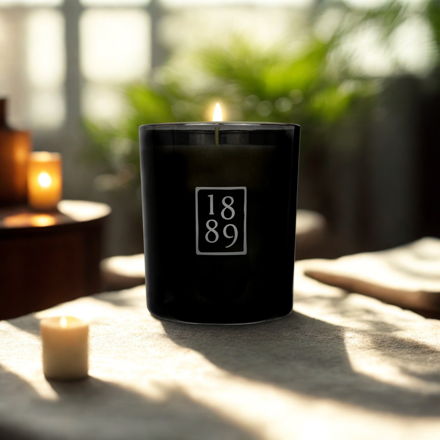 candle with the numbers 1889 on the front