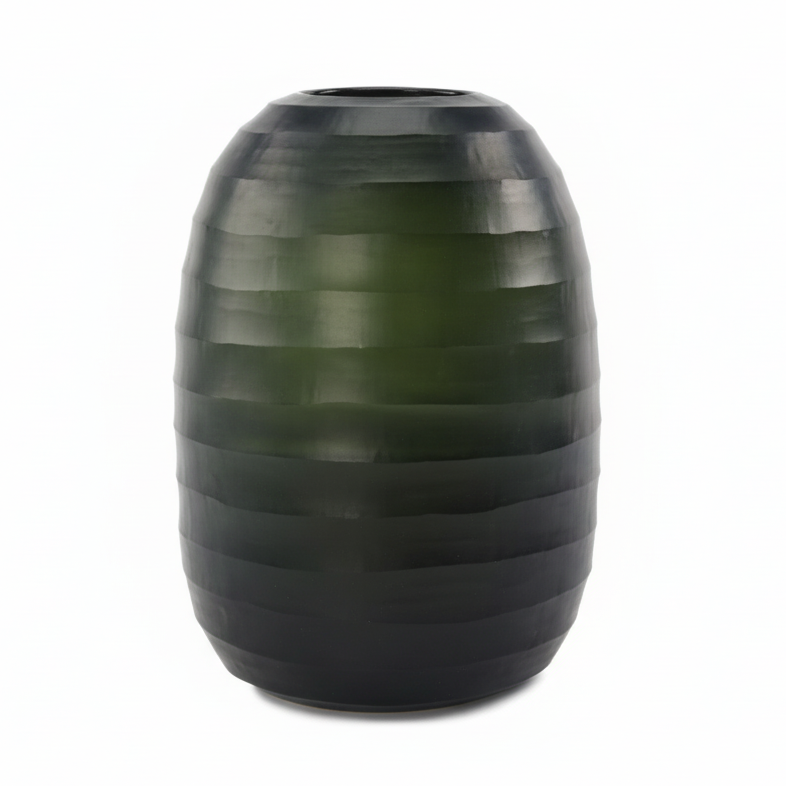 Green striped vase on a white background