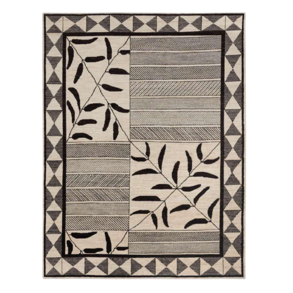 Rug with geometric and leaf pattern on a white background