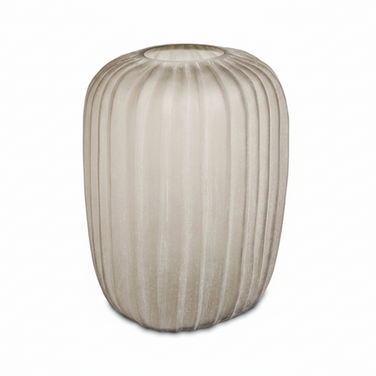 Decorative vase with ribbed texture on a white background