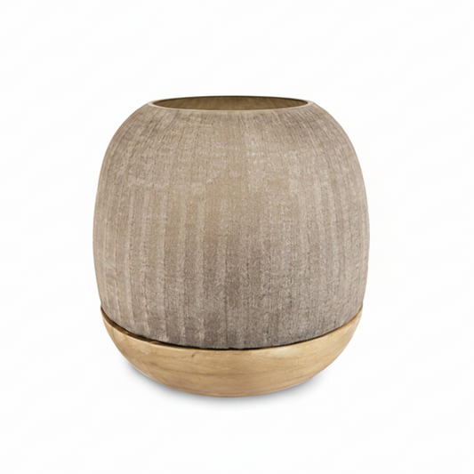 Textured round lantern with wooden base on a white background