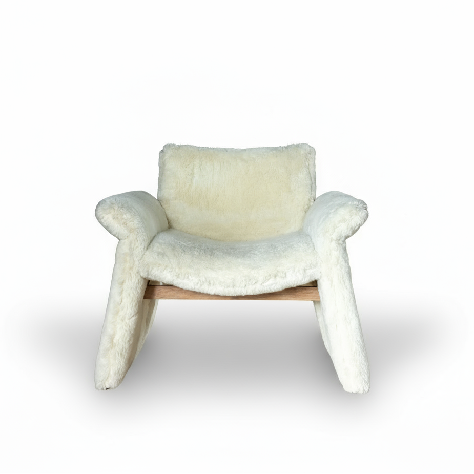 White fur chair on a white background