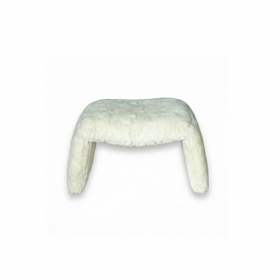 White fluffy cushion on a white background