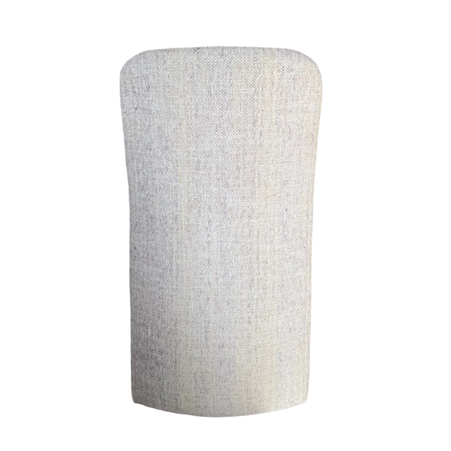 Textured cylindrical stool in a room with a neutral color scheme