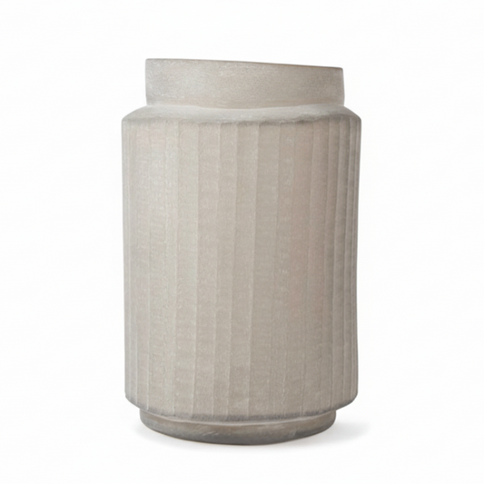 Textured cylindrical vase on a white background